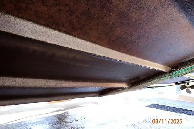 Slide: The Image of Underside view of a 2003 Sea Ray 460 Sundancer boat hull. - 16