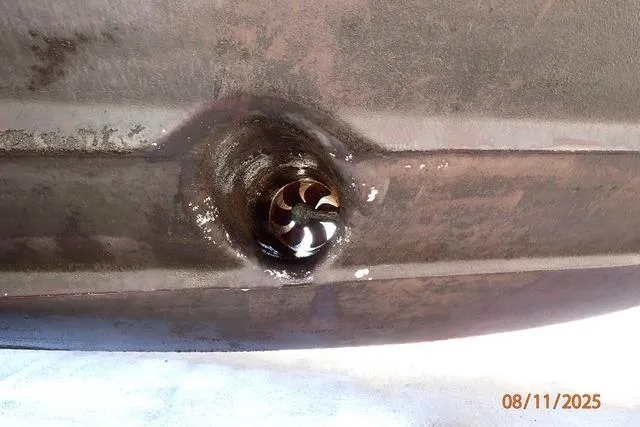 Slide: The Image of Bottom view of 2003 Sea Ray 460 Sundancer boat hull with visible propeller. - 18