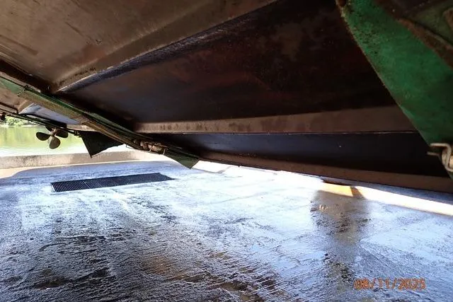 Slide: The Image of Underside view of a 2003 Sea Ray 460 Sundancer boat on a trailer. - 19