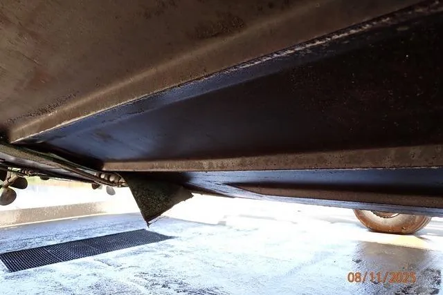 Slide: The Image of Underside view of 2003 Sea Ray 460 Sundancer boat hull, showing structural details. - 20