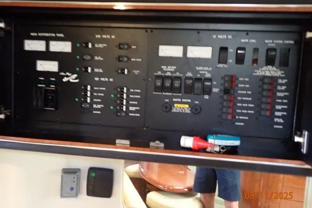 Slide: The Image of Electrical control panel on a 2003 Sea Ray 460 Sundancer yacht. - 39
