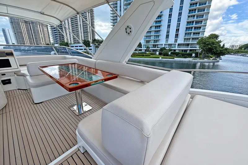 Slide: The Image of Luxurious Azimut Fly 53 yacht deck with elegant seating and table, 2012 model. - 15