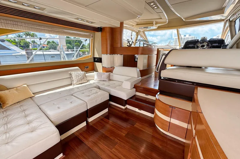 Slide: The Image of Luxurious interior of 2012 Azimut Fly 53 yacht with elegant seating and wooden flooring. - 18
