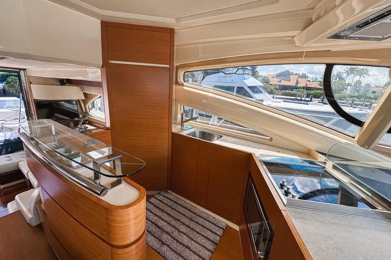 Slide: The Image of Luxurious interior of 2012 Azimut Fly 53 yacht with modern kitchen and sleek design. - 23