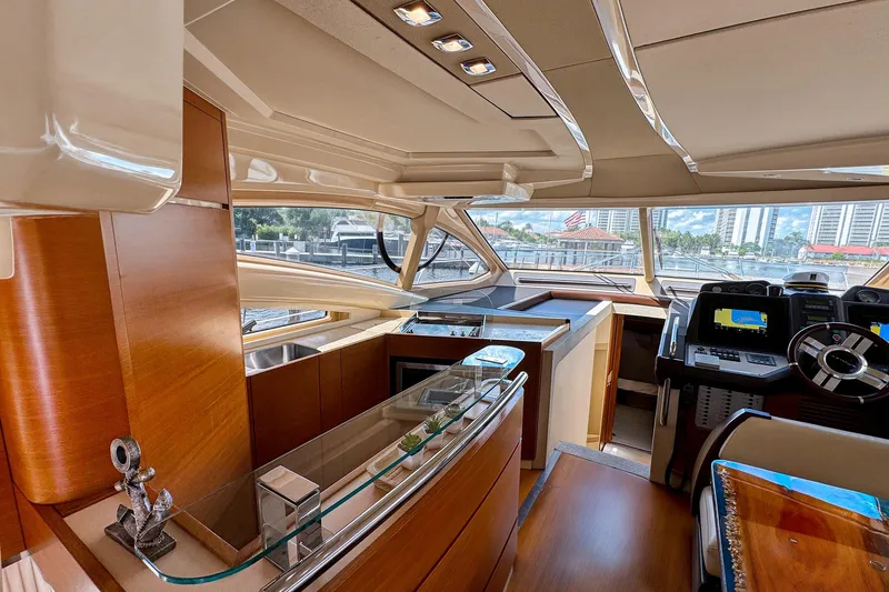 Slide: The Image of Luxurious interior of 2012 Azimut Fly 53 yacht with modern helm and panoramic windows. - 24