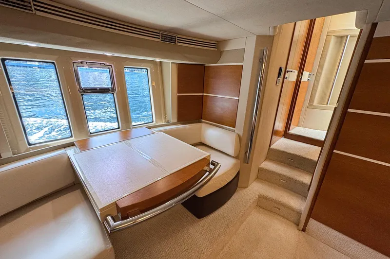 Slide: The Image of Luxurious interior of 2012 Azimut Fly 53 yacht with elegant seating and large windows. - 30