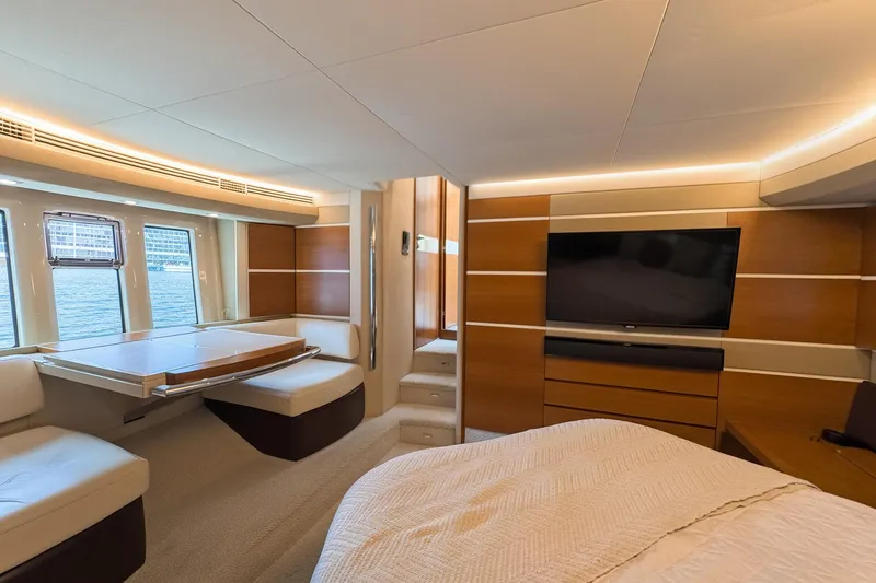 Slide: The Image of Luxurious interior of 2012 Azimut Fly 53 yacht with modern furnishings and large windows. - 31