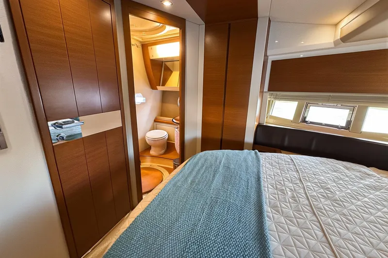 Slide: The Image of Luxurious interior of 2012 Azimut Fly 53 yacht with cozy bedroom and ensuite bathroom. - 33