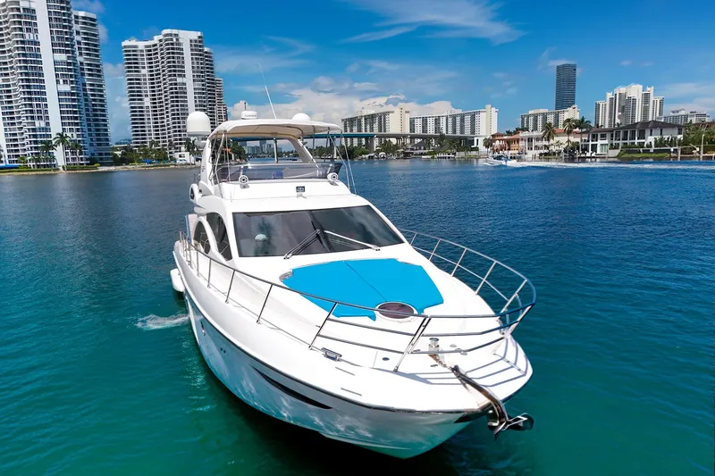 Slide: The Image of Azimut Fly 53 yacht cruising near modern city skyline, 2012 model. - 39