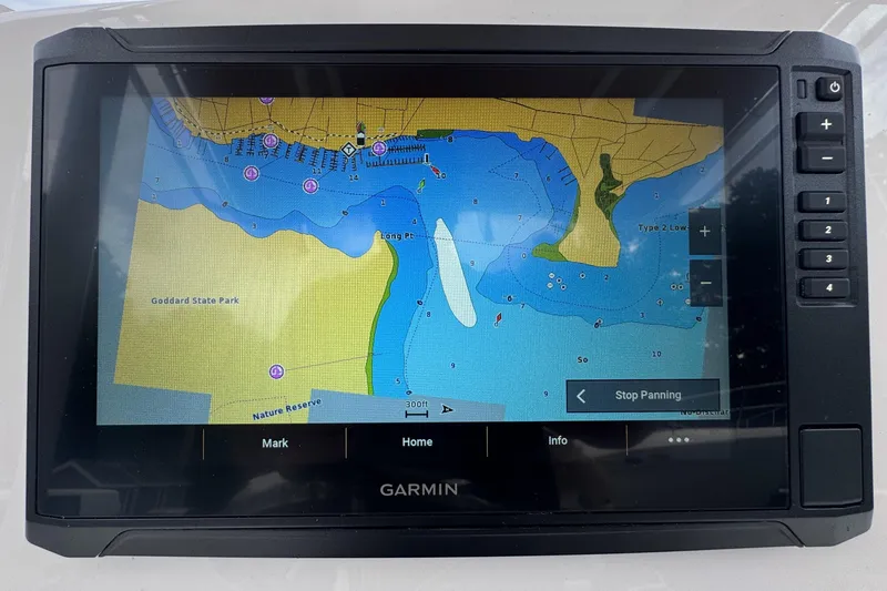 Slide: The Image of Garmin navigation display on 2023 Edgewater 208CC boat, showing coastal map. - 21