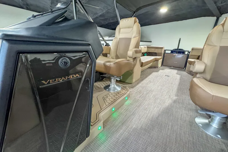 Slide: The Image of Luxurious Veranda Relax VR265RC 2026 boat interior with plush captain's chair and modern dashboard. - 11