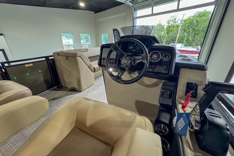 Slide: The Image of 2026 Veranda Relax VR265RC pontoon boat in a modern showroom. - 14