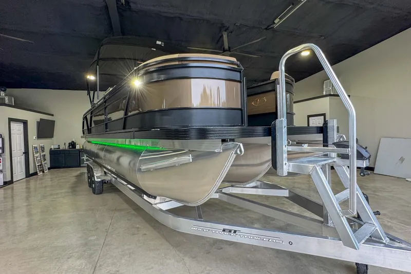 Slide: The Image of Interior of 2026 Veranda Relax VR265RC pontoon boat with luxurious seating and modern dashboard. - 6