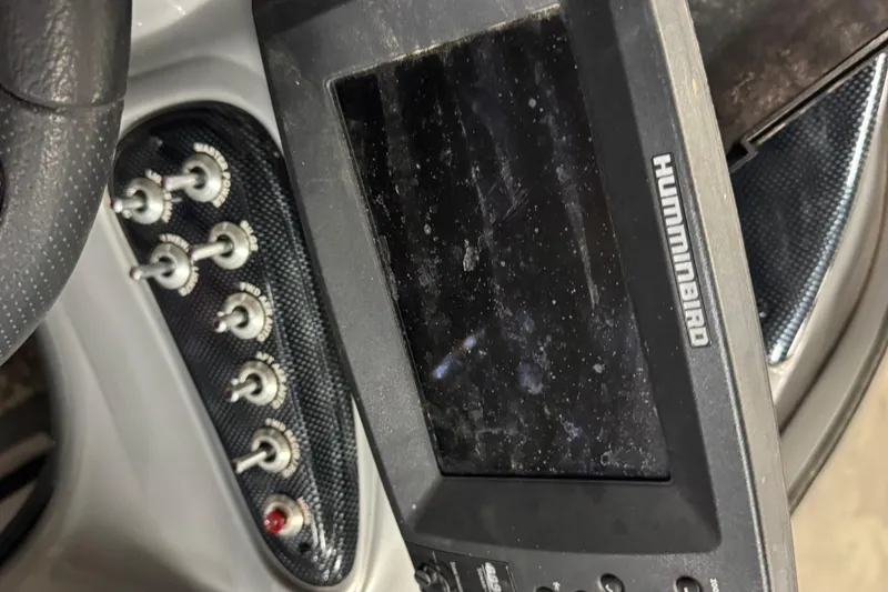 Slide: The Image of Control panel and Humminbird display on 2015 Tracker Targa V-18 Combo boat. - 6