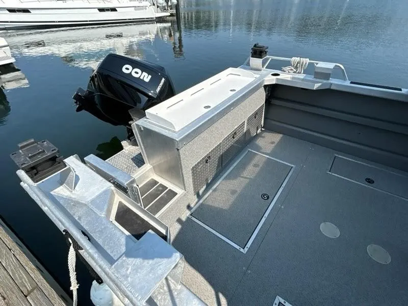 Slide: The Image of Interior of 2023 Thunder Jet 22 Alexis Pro boat, featuring modern seating and control panel. - 3