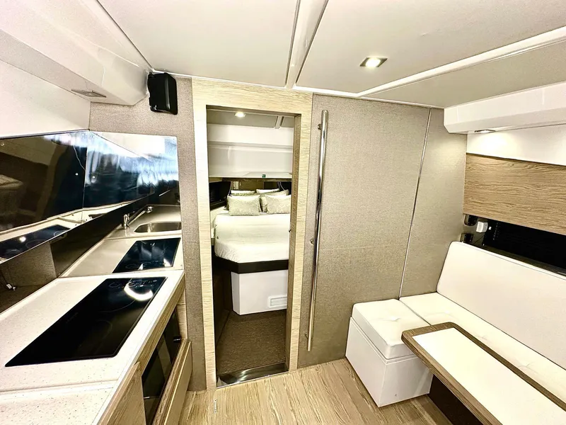 Slide: The Image of Luxurious interior of 2018 Azimut Verve 40 yacht with modern kitchen and cozy seating area. - 27