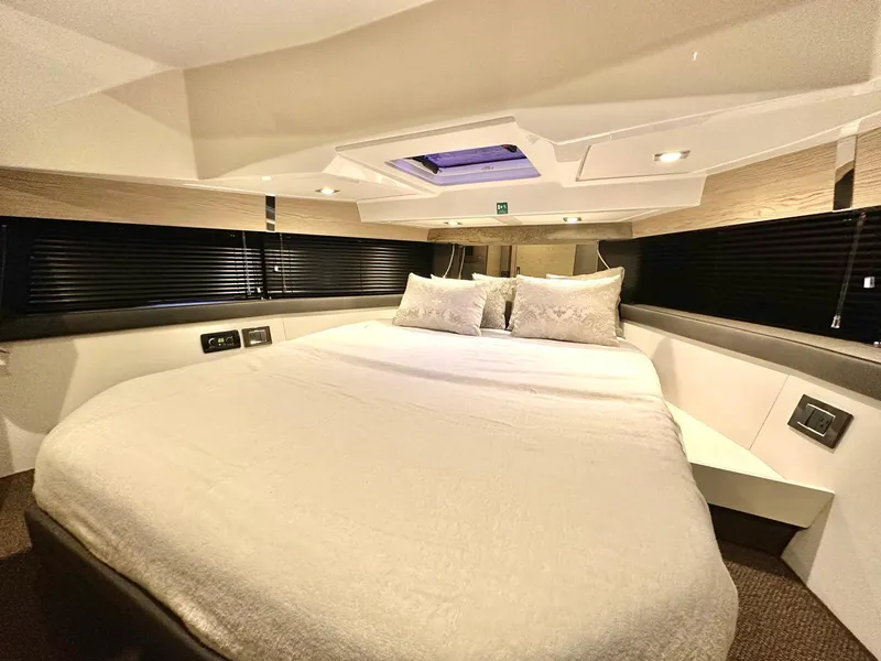 Slide: The Image of Luxurious cabin interior of 2018 Azimut Verve 40 yacht with cozy bedding. - 30