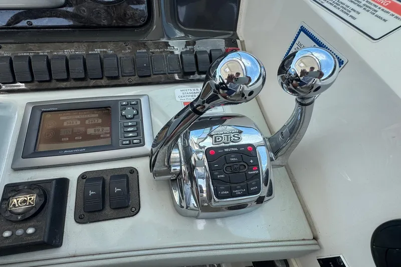 Slide: The Image of Control panel of 2010 Sea Ray 390 Sundancer with SmartCraft DTS system. - 15