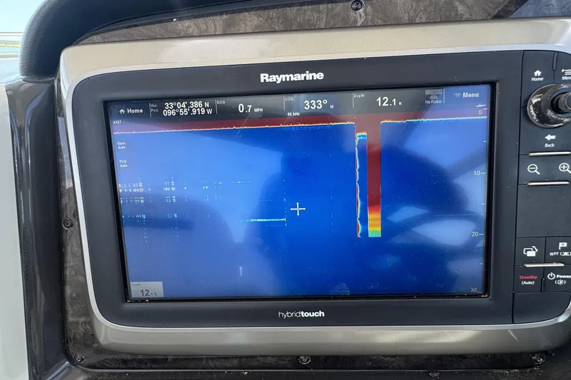 Slide: The Image of Raymarine navigation display on 2010 Sea Ray 390 Sundancer showing depth and coordinates. - 18