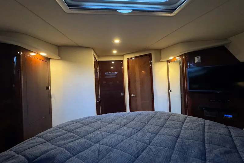 Slide: The Image of Luxurious interior cabin of 2010 Sea Ray 390 Sundancer yacht with modern amenities. - 34