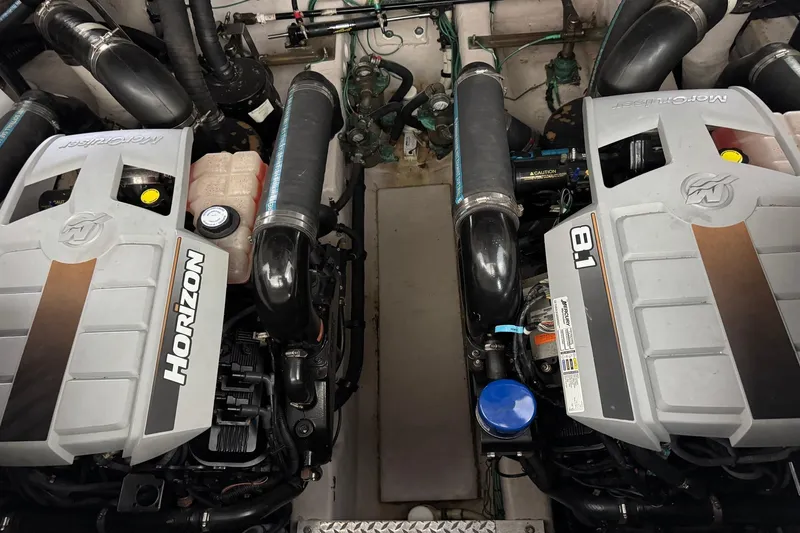 Slide: The Image of Engine room of a 2010 Sea Ray 390 Sundancer with twin Horizon 8.1 engines. - 38