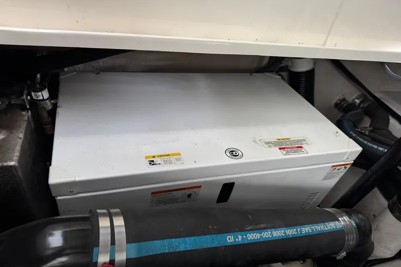 Slide: The Image of Engine compartment of 2010 Sea Ray 390 Sundancer Kohler generator with sound shield. - 41