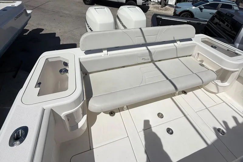 Slide: The Image of 2022 SeaVee 322z boat interior with seating and storage compartments. - 4