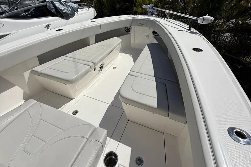 Slide: The Image of 2022 SeaVee 322z boat interior with cushioned seating and sleek design. - 7