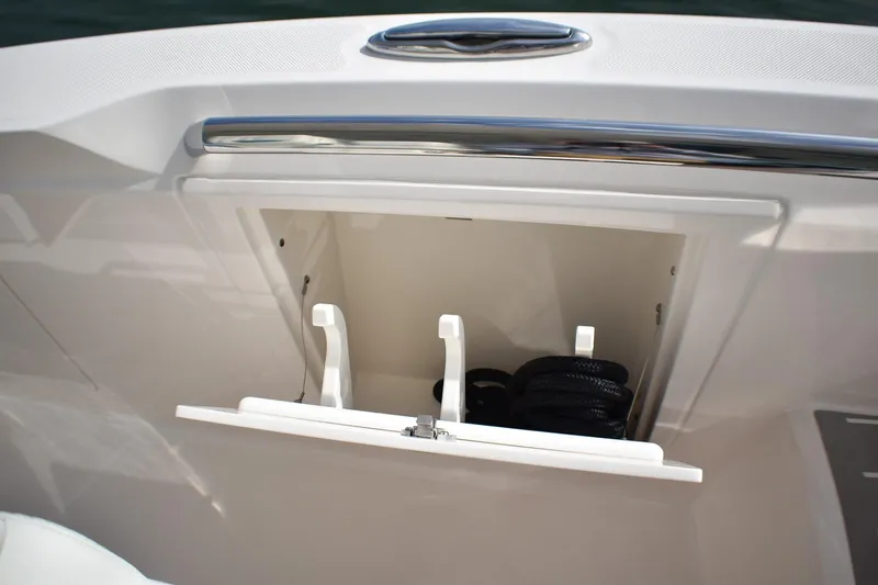 Slide: The Image of Storage compartment on 2025 Tiara Yachts 43 LS, featuring sleek design and practical utility. - 32