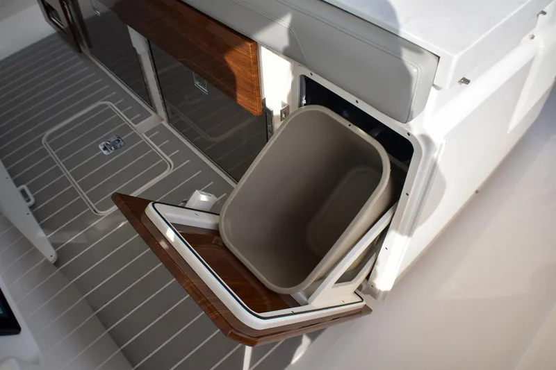 Slide: The Image of Storage compartment on 2025 Tiara Yachts 43 LS, featuring sleek design and functionality. - 34