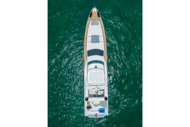 Slide: The Image of Aerial view of 2012 Azimut yacht on clear turquoise water. - 17