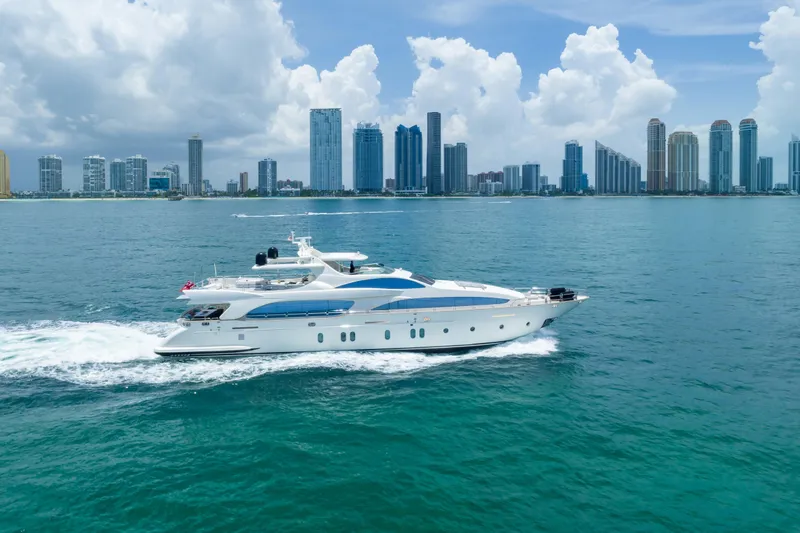 Slide: The Image of Luxury Azimut yacht cruising near city skyline, 2012 model, on a sunny day. - 19