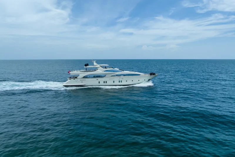 Slide: The Image of Luxurious 2012 Azimut yacht cruising on open sea under clear blue sky. - 22