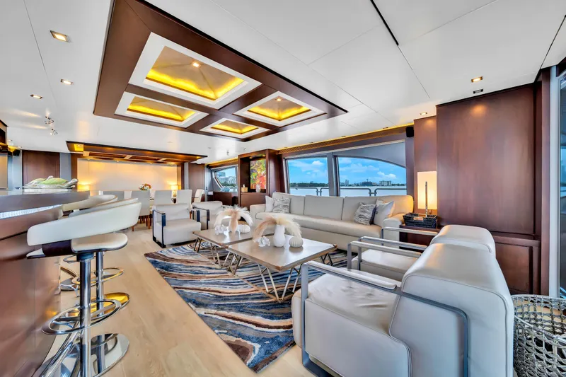 Slide: The Image of Luxurious 2012 Azimut yacht interior with modern furnishings and panoramic windows. - 28