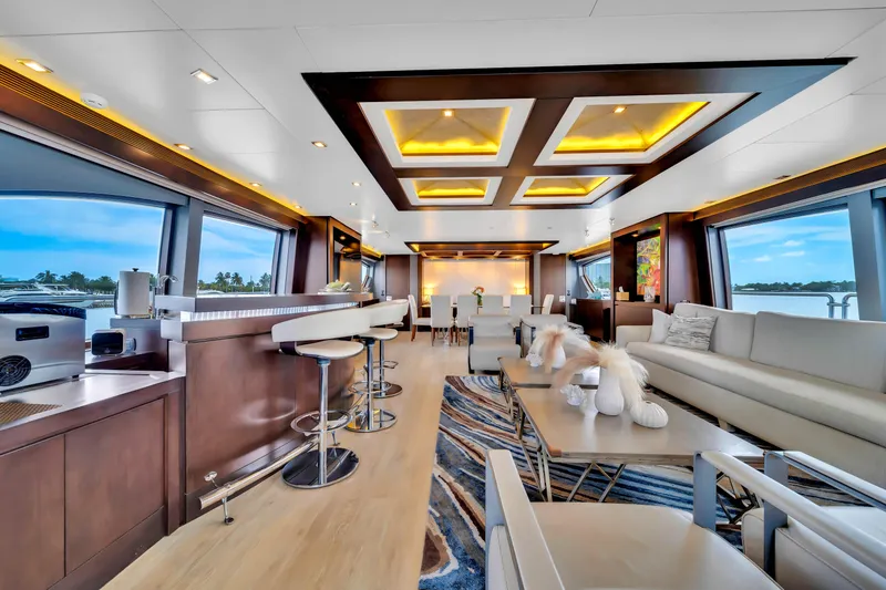 Slide: The Image of Luxurious interior of a 2012 Azimut yacht with modern furnishings and panoramic windows. - 29