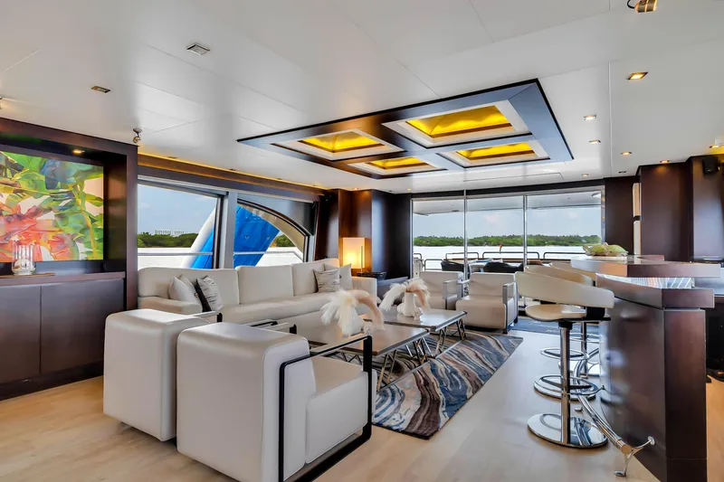 Slide: The Image of Luxurious 2012 Azimut yacht interior with modern decor, plush seating, and panoramic windows. - 44
