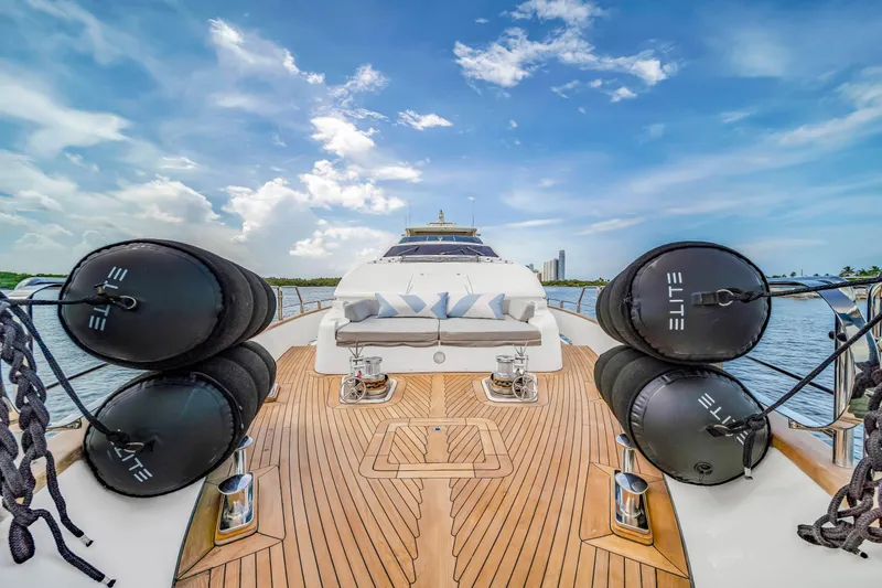 Slide: The Image of Luxurious 2012 Azimut yacht deck with cushions, fenders, and scenic ocean view. - 53