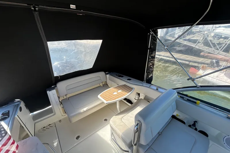 Slide: The Image of Interior of 2017 Boston Whaler 230 Vantage boat with seating and table. - 6