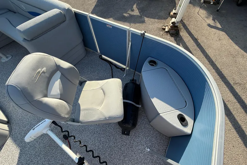 Slide: The Image of 2021 Bennington 20SFi boat interior with seating and fishing rod holder. - 14