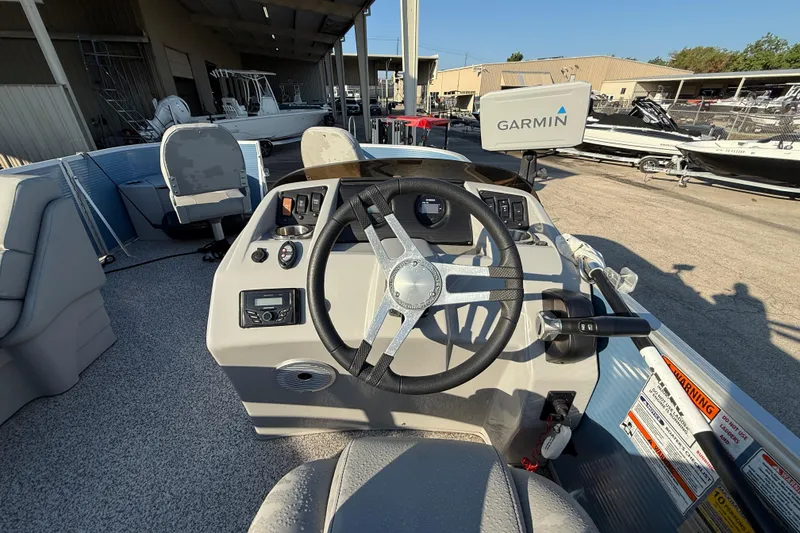 Slide: The Image of 2021 Bennington 20SFi boat dashboard with Garmin navigation system. - 18