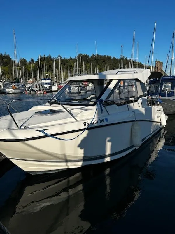 Slide: The Image of 2023 Bayliner Trophy T23 Explorer boat docked in a marina. - 10