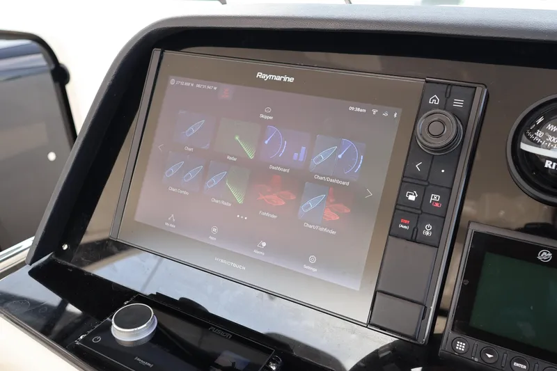 Slide: The Image of Touchscreen navigation system on 2023 Aquila 36 Sport boat dashboard. - 15