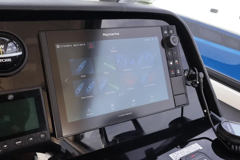 Slide: The Image of Control panel of 2023 Aquila 36 Sport with Raymarine navigation display. - 16