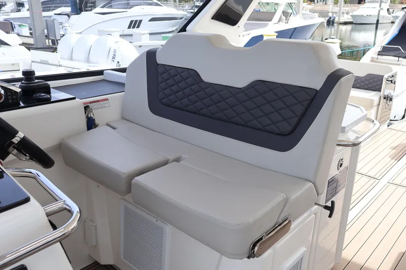 Slide: The Image of Luxury seating on 2023 Aquila 36 Sport boat, featuring modern design and comfort. - 19