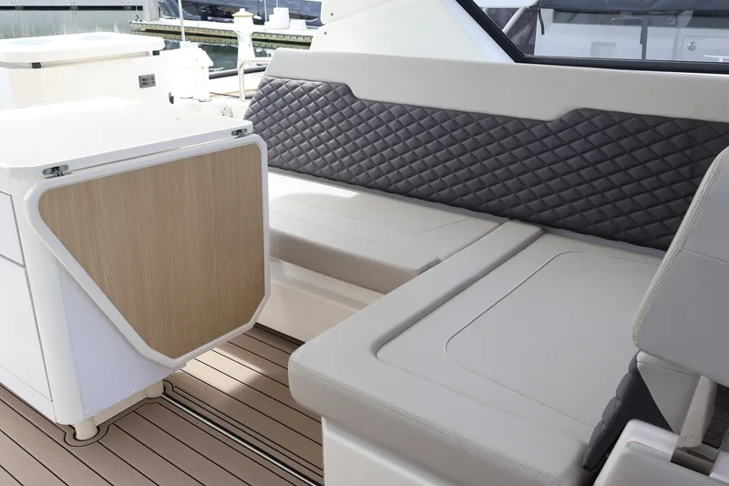 Slide: The Image of 2023 Aquila 36 Sport interior with quilted seating and modern design. - 26