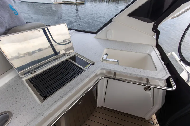 Slide: The Image of Outdoor kitchen on 2023 Aquila 36 Sport yacht with grill and sink. - 30