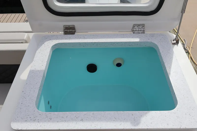 Slide: The Image of Livewell on 2023 Aquila 36 Sport boat, featuring a sleek design and modern functionality. - 43