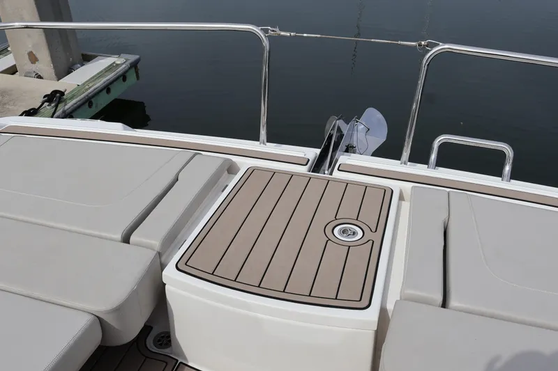 Slide: The Image of 2023 Aquila 36 Sport boat deck with cushioned seating and sleek design. - 50