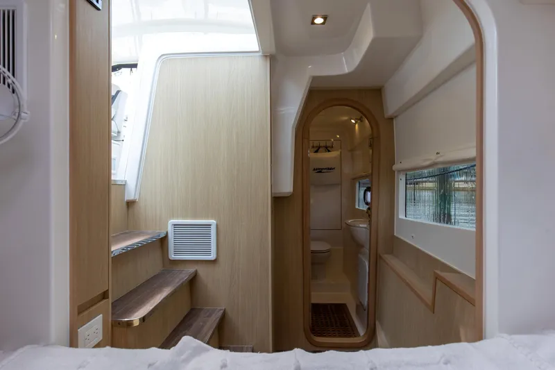Slide: The Image of Interior of 2023 Aquila 36 Sport yacht, featuring modern design and wooden accents. - 51