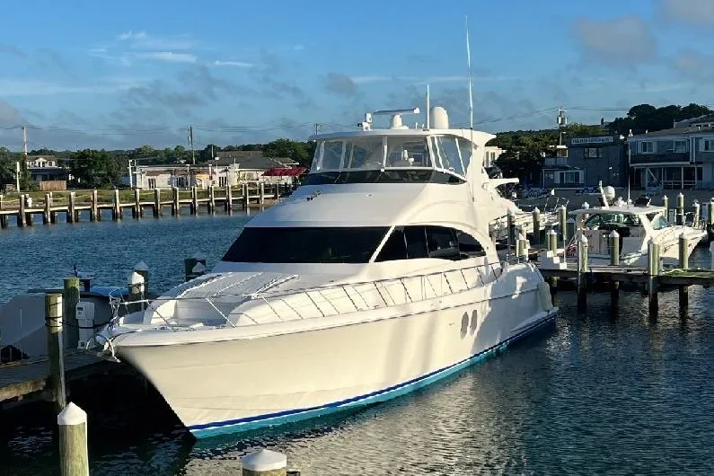 The Image of 2011 Hatteras 60 Motor Yacht on water, featuring luxurious interior and exterior views. - 0